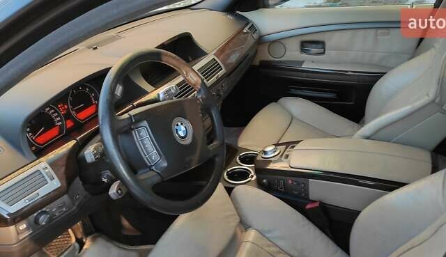 Черный БМВ 7 Серия, объемом двигателя 4.4 л и пробегом 167 тыс. км за 8699 $, фото 6 на Automoto.ua