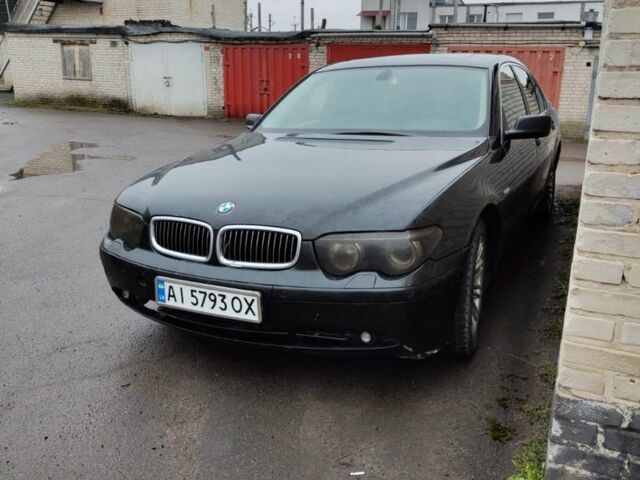 Черный БМВ 7 Серия, объемом двигателя 4.4 л и пробегом 200 тыс. км за 3500 $, фото 1 на Automoto.ua