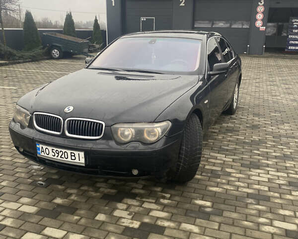 Черный БМВ 7 Серия, объемом двигателя 4.5 л и пробегом 160 тыс. км за 5000 $, фото 1 на Automoto.ua