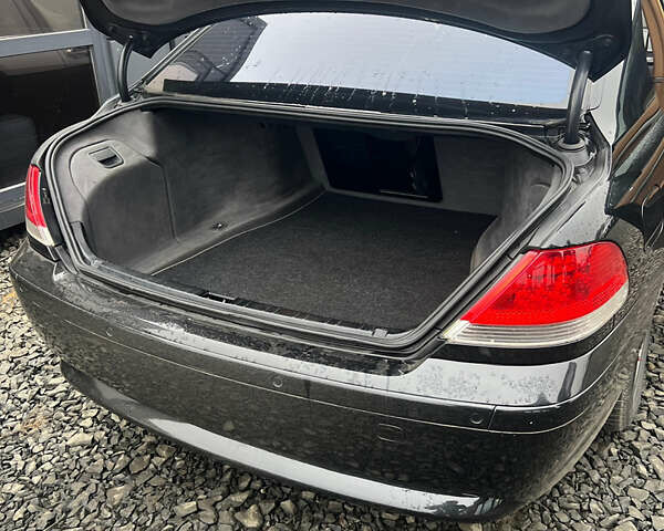 Черный БМВ 7 Серия, объемом двигателя 3.6 л и пробегом 380 тыс. км за 7000 $, фото 12 на Automoto.ua