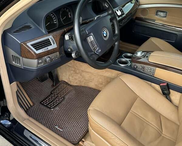 Черный БМВ 7 Серия, объемом двигателя 3.6 л и пробегом 356 тыс. км за 7750 $, фото 1 на Automoto.ua