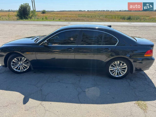 Чорний БМВ 7 Серія, об'ємом двигуна 4.4 л та пробігом 462 тис. км за 5100 $, фото 6 на Automoto.ua