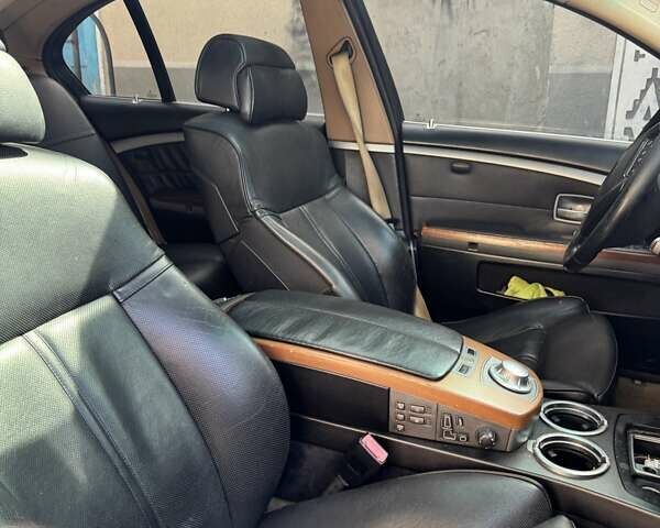 Черный БМВ 7 Серия, объемом двигателя 3 л и пробегом 400 тыс. км за 2500 $, фото 4 на Automoto.ua