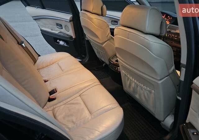 Черный БМВ 7 Серия, объемом двигателя 2.99 л и пробегом 465 тыс. км за 9300 $, фото 25 на Automoto.ua