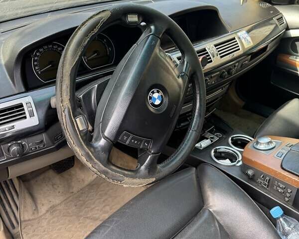 Черный БМВ 7 Серия, объемом двигателя 3 л и пробегом 400 тыс. км за 2500 $, фото 3 на Automoto.ua