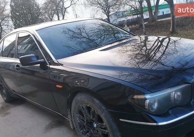 Черный БМВ 7 Серия, объемом двигателя 4.4 л и пробегом 430 тыс. км за 5600 $, фото 7 на Automoto.ua