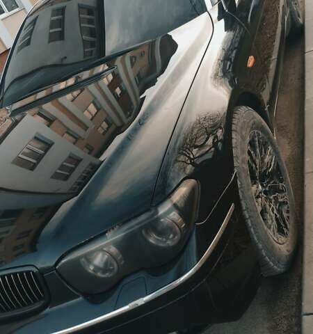 Черный БМВ 7 Серия, объемом двигателя 4.4 л и пробегом 430 тыс. км за 5600 $, фото 5 на Automoto.ua