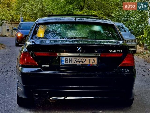Черный БМВ 7 Серия, объемом двигателя 4.4 л и пробегом 277 тыс. км за 5600 $, фото 8 на Automoto.ua