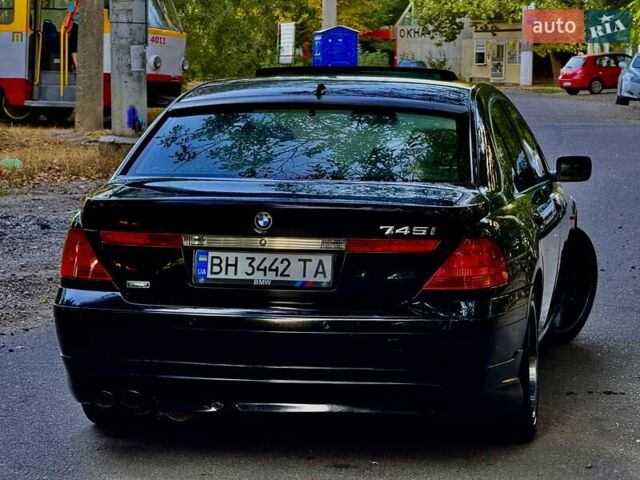 Черный БМВ 7 Серия, объемом двигателя 4.4 л и пробегом 277 тыс. км за 5600 $, фото 16 на Automoto.ua