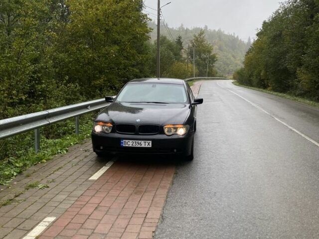 Черный БМВ 7 Серия, объемом двигателя 4.4 л и пробегом 326 тыс. км за 7000 $, фото 2 на Automoto.ua