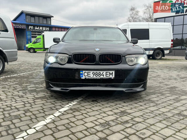 Черный БМВ 7 Серия, объемом двигателя 4.4 л и пробегом 400 тыс. км за 6500 $, фото 1 на Automoto.ua