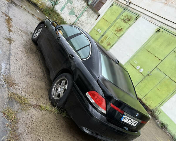 Черный БМВ 7 Серия, объемом двигателя 3.6 л и пробегом 242 тыс. км за 2999 $, фото 2 на Automoto.ua