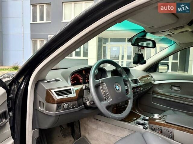 Черный БМВ 7 Серия, объемом двигателя 4.4 л и пробегом 277 тыс. км за 5600 $, фото 32 на Automoto.ua