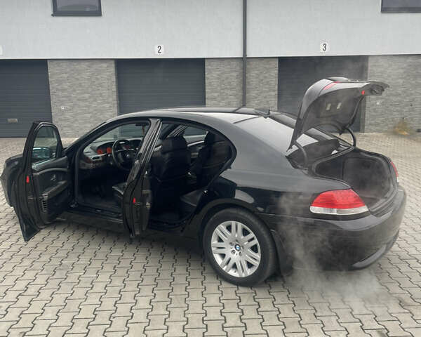 Чорний БМВ 7 Серія, об'ємом двигуна 3 л та пробігом 277 тис. км за 7500 $, фото 28 на Automoto.ua