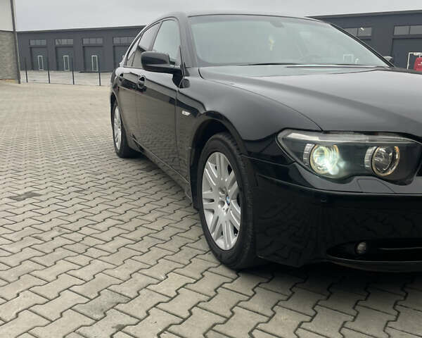 Чорний БМВ 7 Серія, об'ємом двигуна 3 л та пробігом 277 тис. км за 7500 $, фото 3 на Automoto.ua