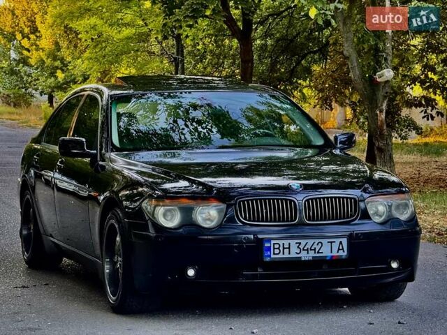 Черный БМВ 7 Серия, объемом двигателя 4.4 л и пробегом 277 тыс. км за 5600 $, фото 1 на Automoto.ua