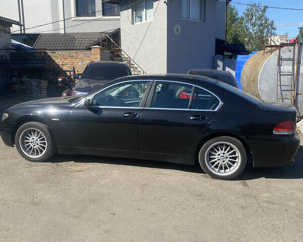 Чорний БМВ 7 Серія, об'ємом двигуна 3 л та пробігом 350 тис. км за 8300 $, фото 1 на Automoto.ua