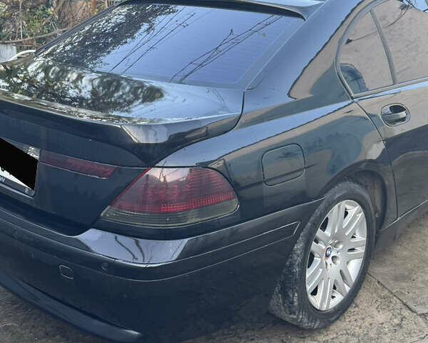 Чорний БМВ 7 Серія, об'ємом двигуна 3.6 л та пробігом 450 тис. км за 8975 $, фото 3 на Automoto.ua