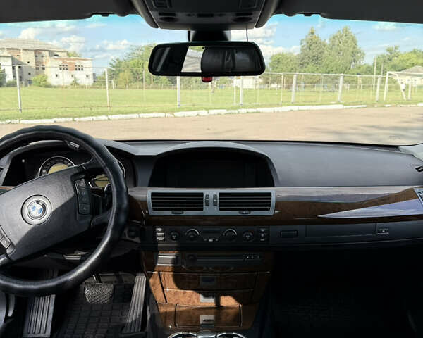 Черный БМВ 7 Серия, объемом двигателя 3 л и пробегом 328 тыс. км за 7000 $, фото 17 на Automoto.ua