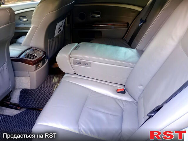 Черный БМВ 7 Серия, объемом двигателя 4.4 л и пробегом 380 тыс. км за 7600 $, фото 4 на Automoto.ua