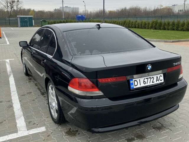 Черный БМВ 7 Серия, объемом двигателя 4.8 л и пробегом 310 тыс. км за 5500 $, фото 4 на Automoto.ua