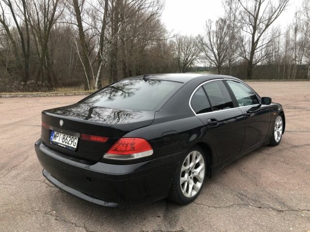 Чорний БМВ 7 Серія, об'ємом двигуна 4 л та пробігом 350 тис. км за 2900 $, фото 1 на Automoto.ua