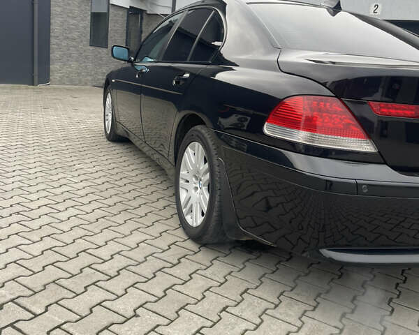 Чорний БМВ 7 Серія, об'ємом двигуна 3 л та пробігом 277 тис. км за 7500 $, фото 4 на Automoto.ua
