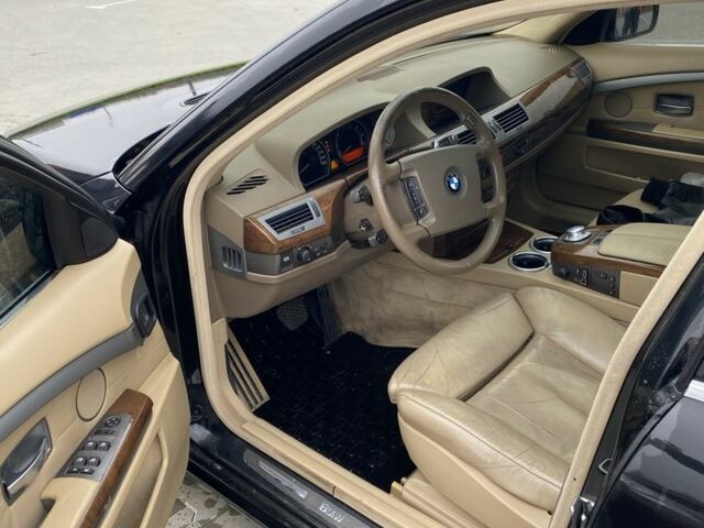 Черный БМВ 7 Серия, объемом двигателя 4.8 л и пробегом 310 тыс. км за 5500 $, фото 5 на Automoto.ua