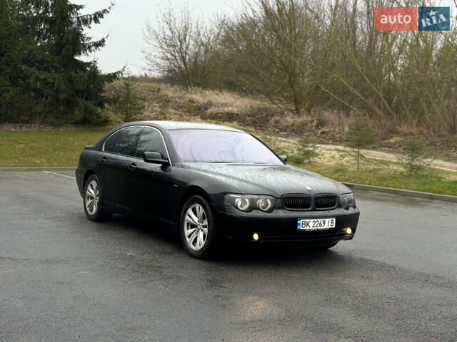 Черный БМВ 7 Серия, объемом двигателя 4 л и пробегом 280 тыс. км за 6500 $, фото 1 на Automoto.ua