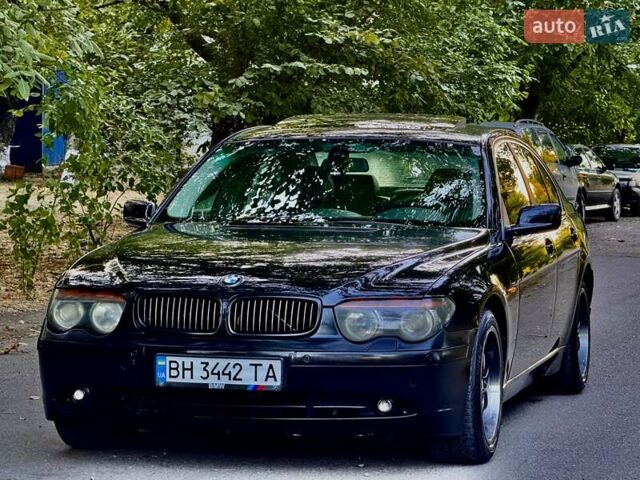 Черный БМВ 7 Серия, объемом двигателя 4.4 л и пробегом 277 тыс. км за 5600 $, фото 5 на Automoto.ua