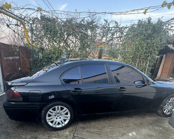 Чорний БМВ 7 Серія, об'ємом двигуна 3.6 л та пробігом 450 тис. км за 8975 $, фото 2 на Automoto.ua
