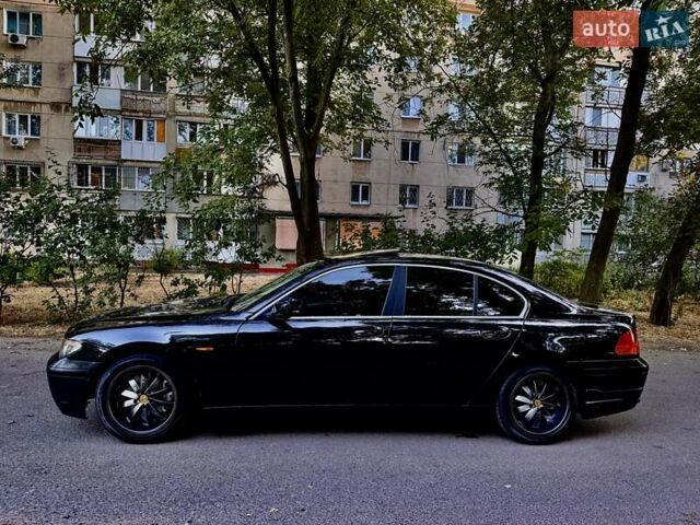 Черный БМВ 7 Серия, объемом двигателя 4.4 л и пробегом 277 тыс. км за 5600 $, фото 4 на Automoto.ua