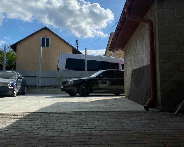 Черный БМВ 7 Серия, объемом двигателя 4.4 л и пробегом 325 тыс. км за 6700 $, фото 7 на Automoto.ua