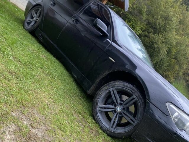 Черный БМВ 7 Серия, объемом двигателя 4.4 л и пробегом 326 тыс. км за 7000 $, фото 1 на Automoto.ua