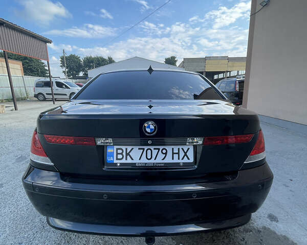 Черный БМВ 7 Серия, объемом двигателя 3.5 л и пробегом 257 тыс. км за 5900 $, фото 2 на Automoto.ua