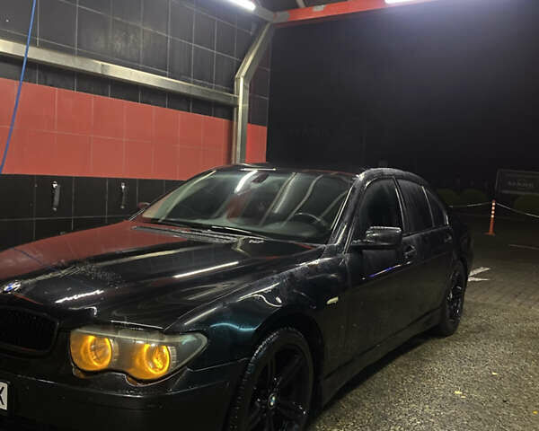 Черный БМВ 7 Серия, объемом двигателя 4.4 л и пробегом 325 тыс. км за 6700 $, фото 5 на Automoto.ua