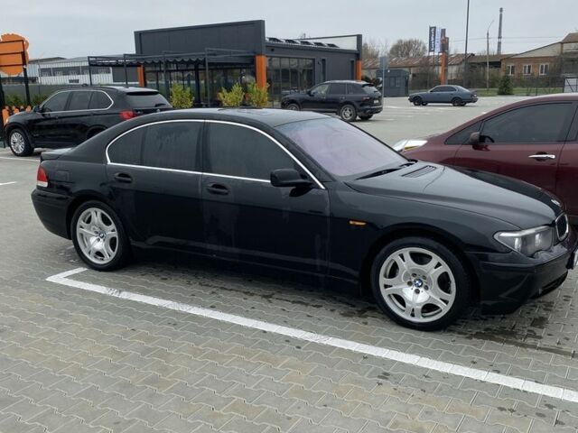 Черный БМВ 7 Серия, объемом двигателя 4.8 л и пробегом 310 тыс. км за 5500 $, фото 2 на Automoto.ua