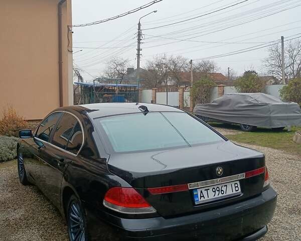 Чорний БМВ 7 Серія, об'ємом двигуна 2.99 л та пробігом 412 тис. км за 7500 $, фото 1 на Automoto.ua