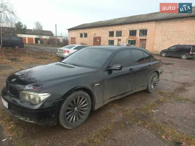 Черный БМВ 7 Серия, объемом двигателя 3 л и пробегом 420 тыс. км за 7000 $, фото 1 на Automoto.ua
