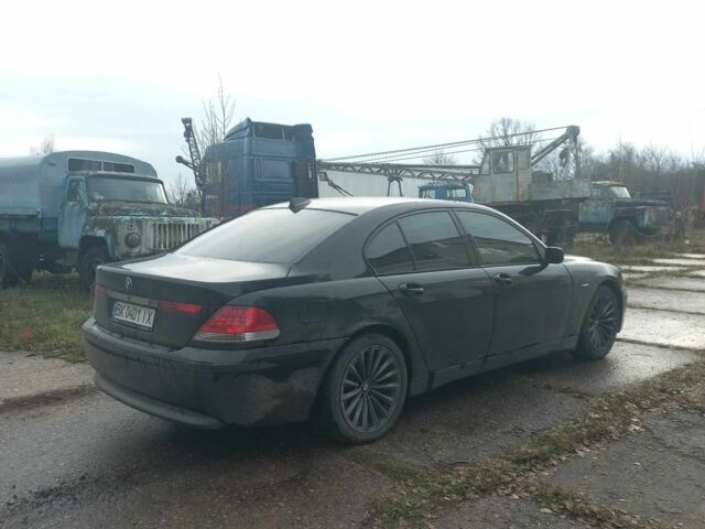 Черный БМВ 7 Серия, объемом двигателя 3 л и пробегом 420 тыс. км за 7000 $, фото 4 на Automoto.ua