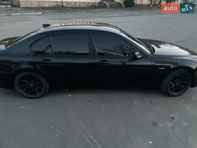 Черный БМВ 7 Серия, объемом двигателя 4.4 л и пробегом 196 тыс. км за 7200 $, фото 17 на Automoto.ua