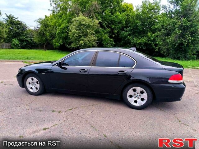 Чорний БМВ 7 Серія, об'ємом двигуна 4.4 л та пробігом 410 тис. км за 7700 $, фото 1 на Automoto.ua