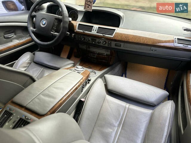 Черный БМВ 7 Серия, объемом двигателя 4.4 л и пробегом 262 тыс. км за 4200 $, фото 8 на Automoto.ua