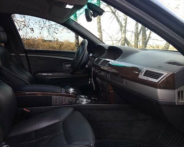 Черный БМВ 7 Серия, объемом двигателя 4.4 л и пробегом 282 тыс. км за 8000 $, фото 4 на Automoto.ua