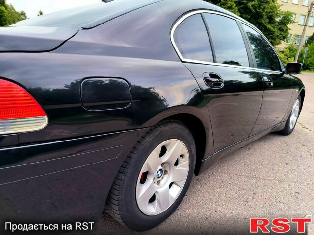 Чорний БМВ 7 Серія, об'ємом двигуна 4.4 л та пробігом 410 тис. км за 7700 $, фото 4 на Automoto.ua