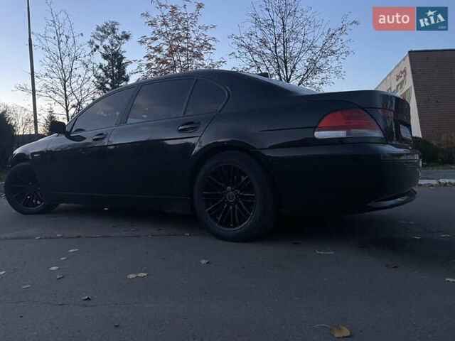 Черный БМВ 7 Серия, объемом двигателя 4.4 л и пробегом 196 тыс. км за 7200 $, фото 22 на Automoto.ua