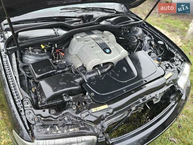 Черный БМВ 7 Серия, объемом двигателя 3.6 л и пробегом 300 тыс. км за 2700 $, фото 8 на Automoto.ua