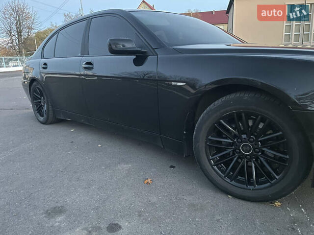 Черный БМВ 7 Серия, объемом двигателя 4.4 л и пробегом 196 тыс. км за 7200 $, фото 32 на Automoto.ua