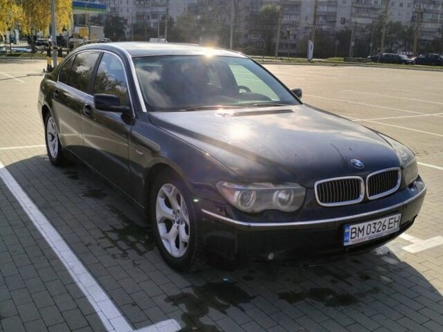 Черный БМВ 7 Серия, объемом двигателя 4.4 л и пробегом 240 тыс. км за 7000 $, фото 1 на Automoto.ua