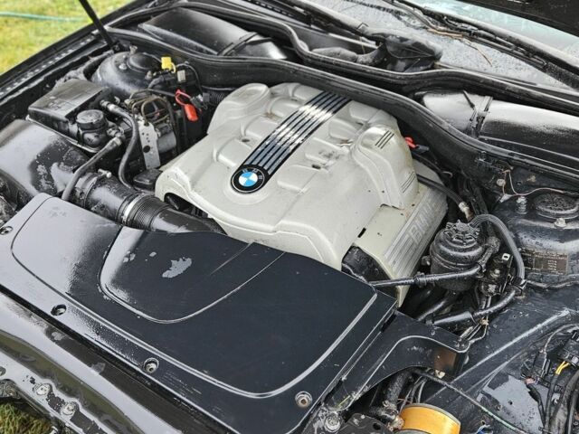 Черный БМВ 7 Серия, объемом двигателя 3 л и пробегом 300 тыс. км за 2700 $, фото 14 на Automoto.ua